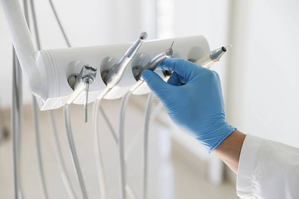 Professional Emergency Dentist technician working in Framingham, MA